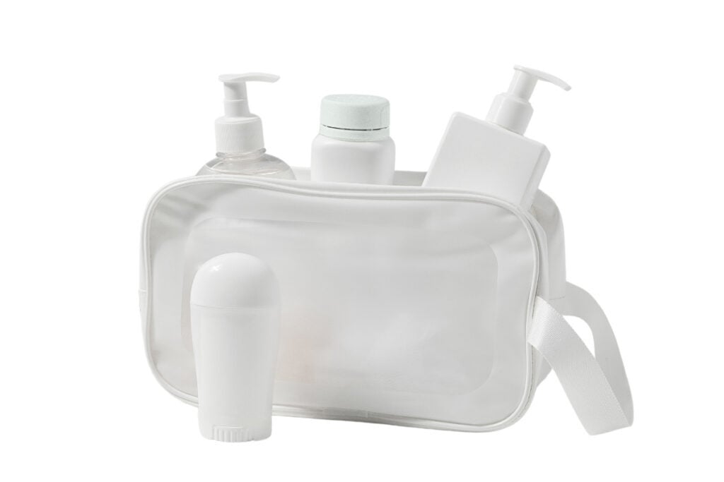 Toiletry bag with bathroom items packed for moving.