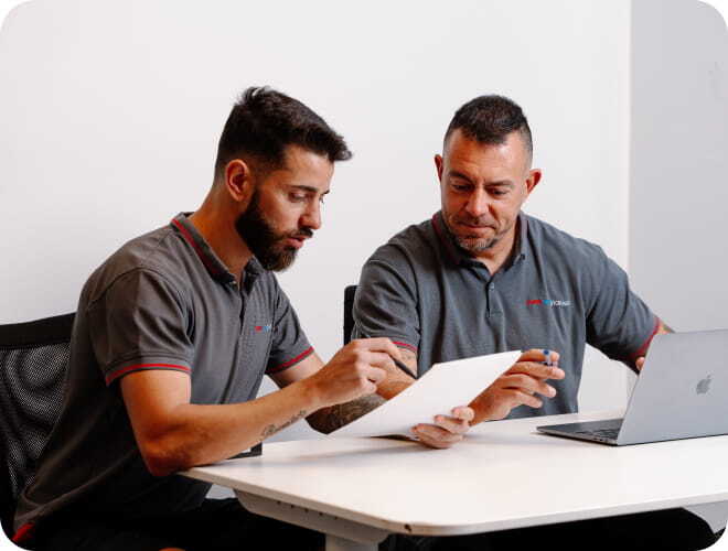 Professional removalists planning a move together